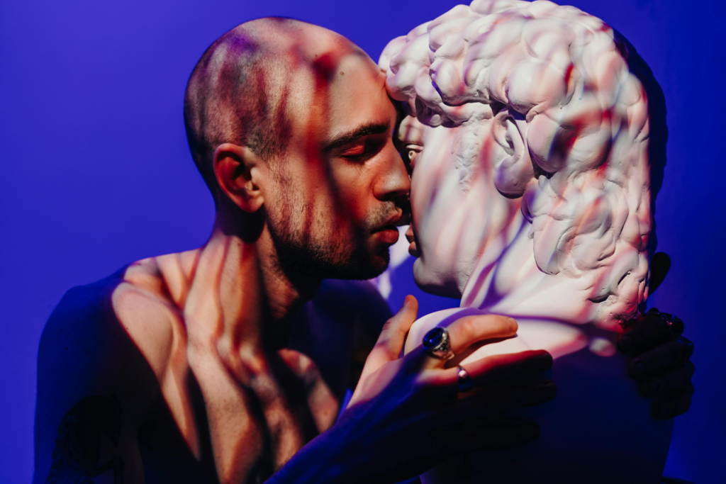 Man Kissing a Gypsum Head